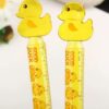 Regla plástica infantil con diseño de patitos